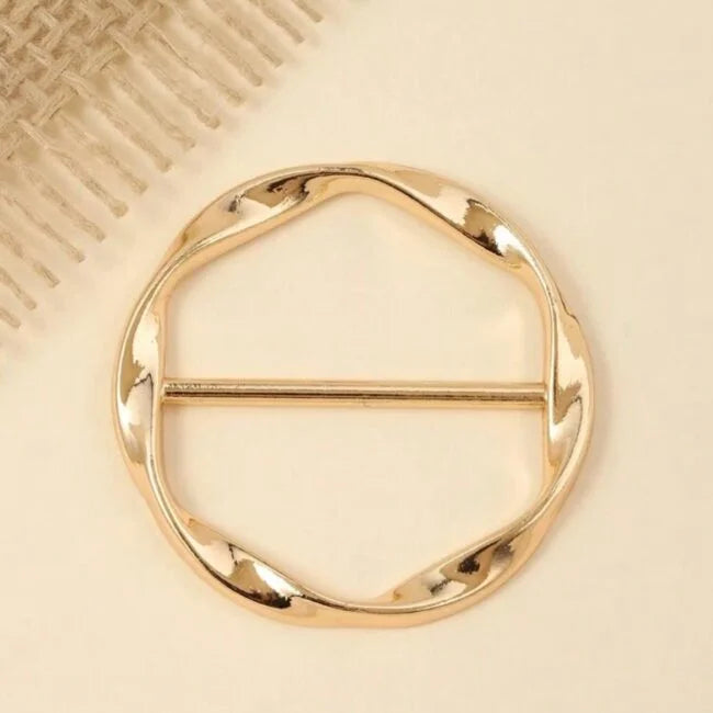 Broche dorée